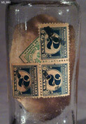 Detail of US tax stamp on Azurea bottle